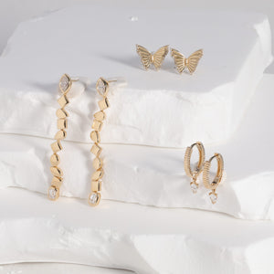 Dangling Pear Diamond Gold Fluted Huggies